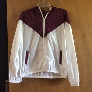 red and white windbreaker